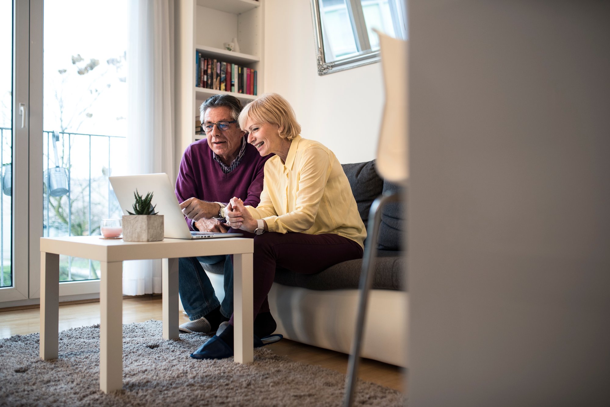 couple-viewing-computer couple-viewing-computer